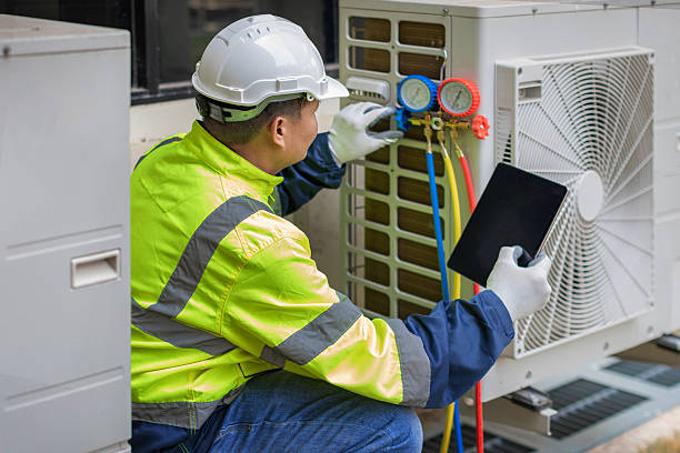 Professional Hvac technician working in Hampton, NH